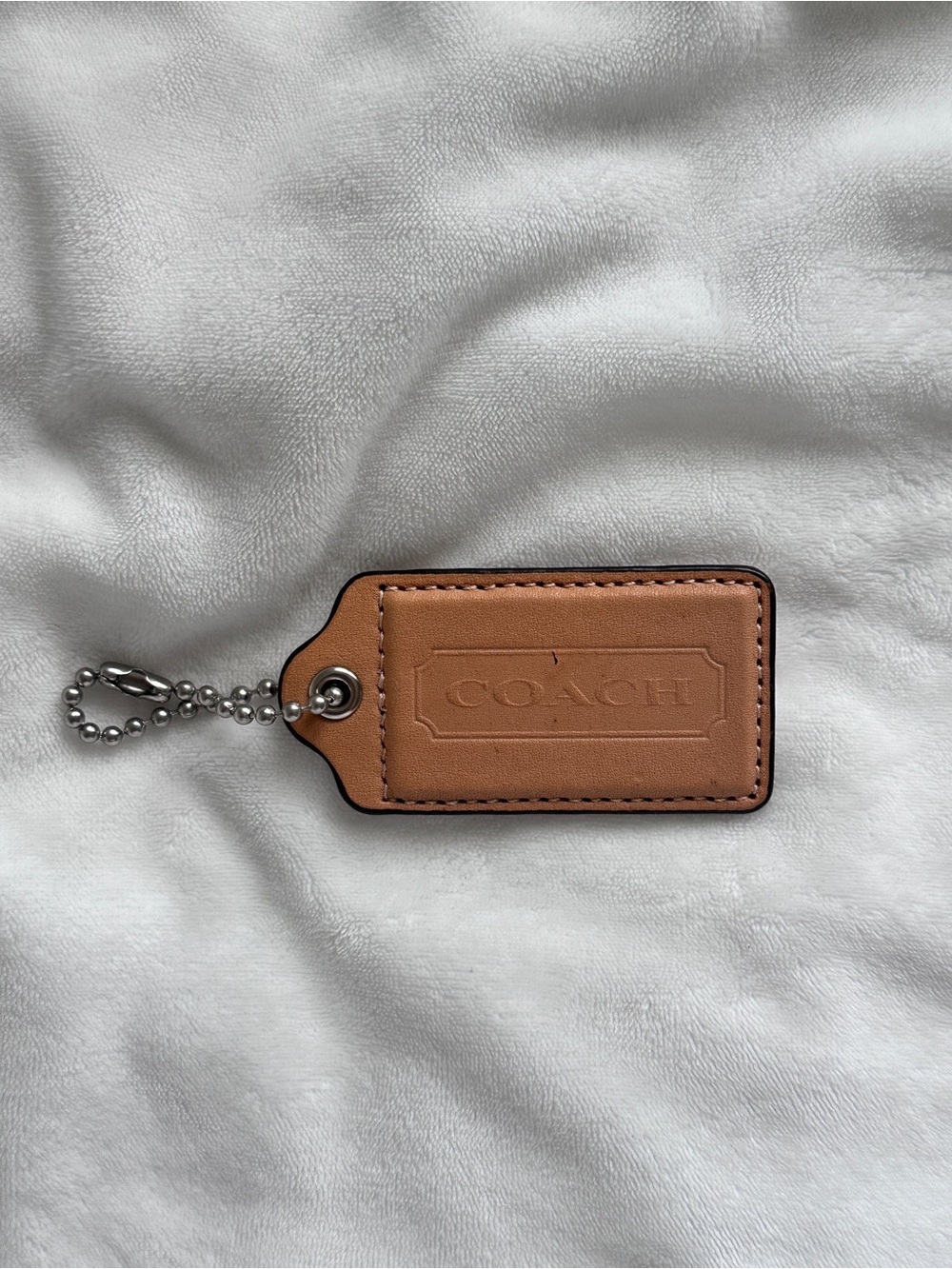 Coach Hang Tag